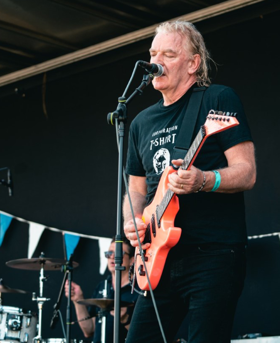 Mark James Ross on guitar and vocals with The Climate Stripes (Various festivals, Summer 2022)